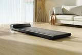 Achteraanzicht van de Kingsmith WalkingPad A1 Plus loopband in een lege woonkamer